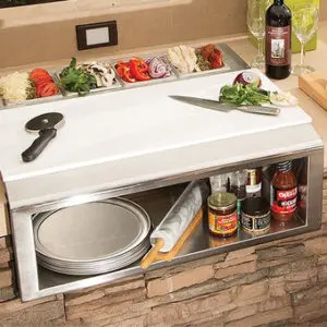 Organized kitchen storage with plates, spices, and wine.