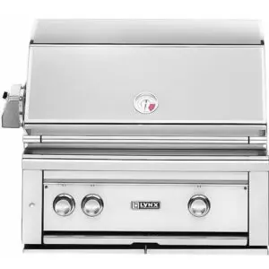 Stainless steel built-in gas grill with control knobs and a closed lid.