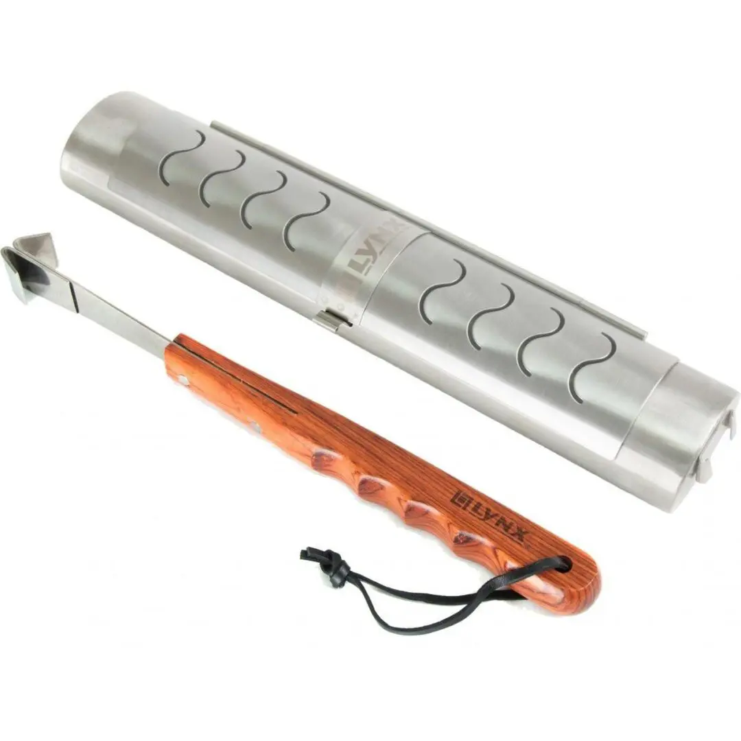 A metal and wooden tool with a leather strap and a metallic holder.