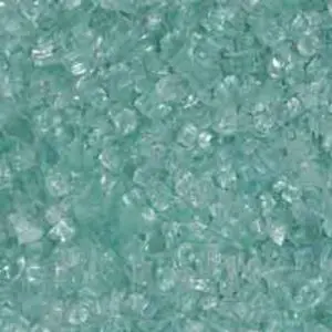 Close-up of turquoise crushed glass pieces.