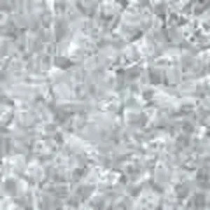 Close-up of a textured, gray stone surface with irregular patterns.