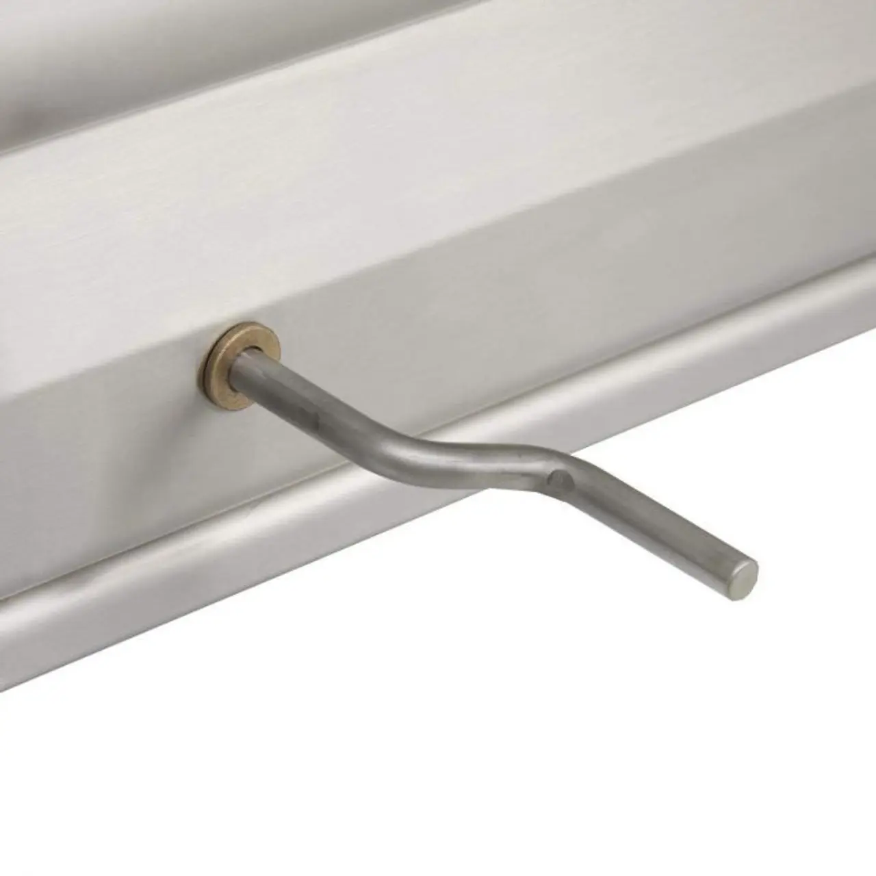 Close-up of a metal rod attached to a white surface.
