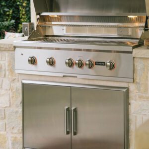 Stainless built-in Coyote grill with six knobs